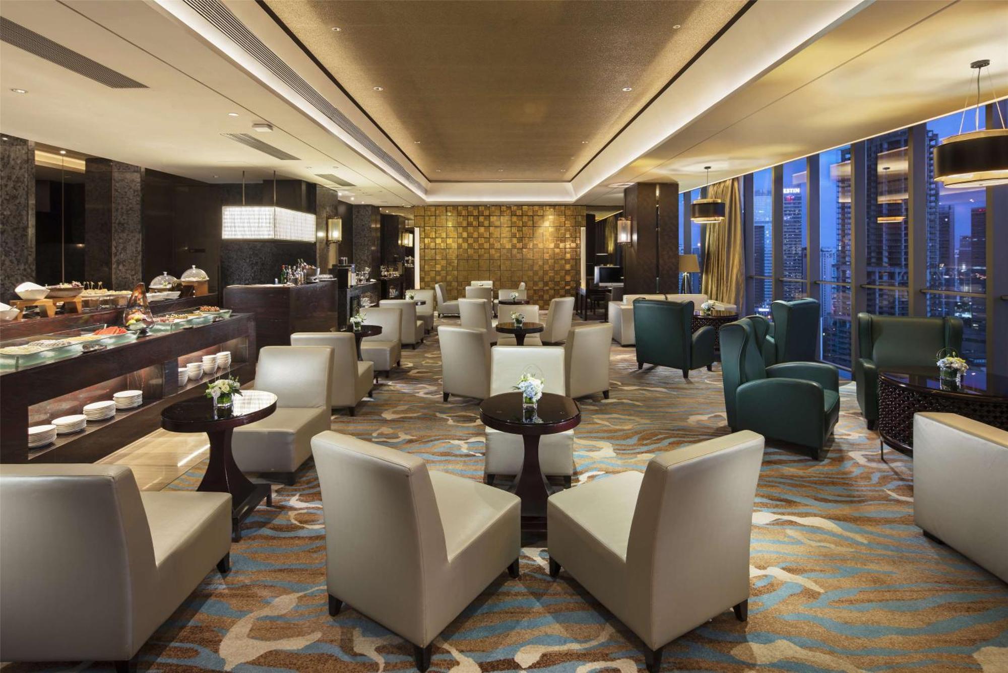 Hilton Guangzhou Tianhe - Free Shuttle Bus And Registration Counter Available During Canton Fair Period Eksteriør billede The Club lounge at Beijing Capital International Airport